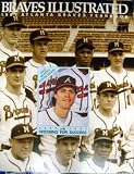 1987 Atlanta Braves Yearbook Autographed/Hand Signed by Tom Glavine, Chuck Tanner, Warren Spahn, Edd