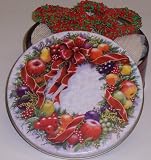 Scott's Cakes 1 lb. Milk Chocolate Covered Pretzel with Christmas Jimmies in a Wreath Tin