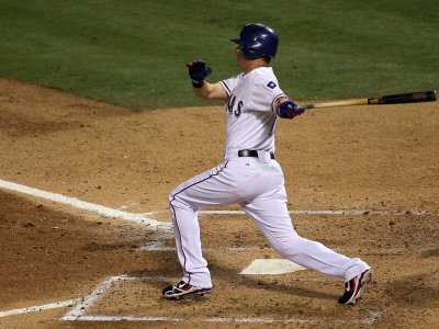 San Francisco Giants v Texas Rangers, Game 3: Michael Young Photographic Poster Print by Stephen Dunn, 18x24