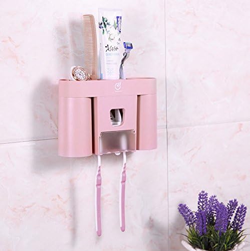 Creative toothbrush holder sets automatic toothpaste dispenser wall suction toothbrush holder toothpaste holder Tumbler couple (Pink)