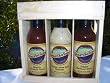 Chipotle Barbecue Sauce, Original Barbecue Sauce, Tuscan Lemon Herb Marinade in a Wooden Crate