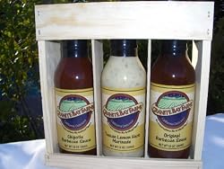 Chipotle Barbecue Sauce, Original Barbecue Sauce, Tuscan Lemon Herb Marinade in a Wooden Crate