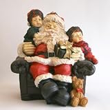 Retro Weihnachtsmann im Sessel mit Kindern