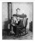 Historic Print (L): [Aged man posed near a stove]