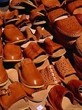 Shoes from Tatra Mountains Region for Sale, Poland Costume & Fashion Photographic Poster Print by Krzysztof Dydynski, 42x56