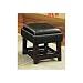 Black vinyl stool with flip top seat