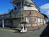 Young Women Walking Round a Corner on a Street in Galle, Sri Lanka Scenic Photographic Poster Print by Yadid Levy, 12x9