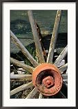 Close Up of an Old Wooden Wagon Wheel,Tombstone, Arizona, USA Collections Framed Photographic Poster Print by Richard Cummins, 24x34