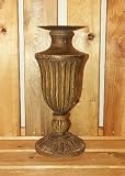 Cover art for  Green and Brown Vase with Vertical Line Design