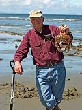 Man Crabbing and Digging for Razor Clams in Sand, Queen Charlotte Islands, Canada Photographic Poster Print by Savanah Stewart, 36x48