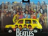 Corgi - ThE BeAtLeS "Sgt. Peppers" Album Theme Austin Taxi Detailed Diecast 1:50 Scale Collector