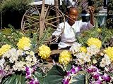 Carder Working on a Bedecked Floral Boat, Flowers Festival, Chiang Mai, Thailand Photographic Poster Print by Marco Simoni, 9×12