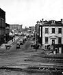 Federal Wagon Train Heads Up Whitehall Street in Atlanta, 1864 - 16x20-inch - Fine-Art-Quality Photographic Print of an Image from the Library of Congress Collection