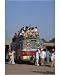 10x8 Photograph (25x20cm) Overloaded bus with men riding on the roof near Multan in Pakistan by Robert Harding