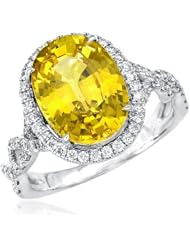 18K White Gold 0.56 CTW Color G SI2-SI3 Diamond and 5.22 CTW Sapphire Cocktail Women Ring. Ring Size 6. Total Item weight 6.1 g.
