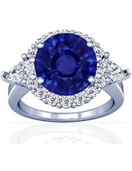 Platinum Round Cut Blue Sapphire Ring With Sidestones