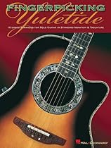Fingerpicking Yuletide: 16 Songs Arranged for Solo Guitar in Standard Notation & Tab