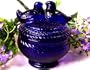 Cobalt Blue Lovebirds Atop Jar