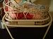 ANTIQUE LOOK SWINGING DOLL CRADLE WITH DOLL AND QUILT