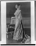 [Alice Roosevelt Longworth, full-length portrait, standing next to chair, facing left] Reprint (8 x 10 inches)