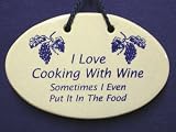 POTTERY WALL PLAQUE WITH SAYING I LOVE COOKING WITH WINE