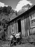 Mountain Farm Family Sitting in Front of their House Collections Photographic Poster Print by Ed Clark, 30×40