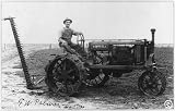 Man,McCormick Deering Farmall tractor,reaper,c1930