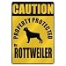 CAUTION  PROPERTY PROTECTED BY ROTTWEILER  PARKING SIGN DOG