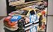2009 Kyle Busch #18 MMs M&Ms Toyota Camry Car of Tomorrow COT Front Splitter Rear Wing 1/24 Scale Diecast Hood Opens Trunk Opens HOTO Limited Production Action Racing Collectables ARC