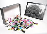 Photo Jigsaw Puzzle of Gardener collecting dead leaves, Maiden Erlegh, Berkshire from Mary Evans