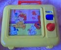Small Vintage Musical Television Toy with Handle