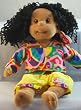 Ty Beanie Kid - Calypso in yellow shorts in rainbow colored shirt