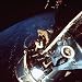 Astronaut Dave Scott Gazing from Hatch of Apollo 9 Command Module Toward Untested Lunar Module Photographic Poster Print, 24x24