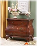 Terra Cotta Spice Bombe Chest Console By Ashley Furniture