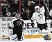 Dominic Moore Autographed Unframed 8x10 Pittsburgh Penguins Photo vs. The Flyers
