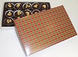 Scott's Cakes 1 lb. Dark Chocolate Macadamia Nut Cluster in a Christmas Plaid Box