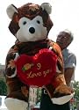 GIANT 60" TEDDY BEAR OLDING I LOVE YOU HEART - COLOR: WARM BROWN & ORANGE - PERFECT FOR VALENTINES DAY OR ANY DAY - AMERICAN MADE IN THE USA AMERICA