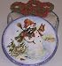 Scott's Cakes 1 lb. Milk Chocolate Covered Pretzel with Christmas Jimmies in a Classic Snowman Tin