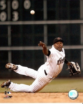 Miguel Tejada Astros Flipping Baseball 8x10 Photo