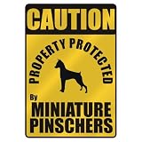 CAUTION  PROPERTY PROTECTED BY MINIATURE PINSCHERS  PARKING SIGN DOG