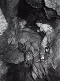 Spelunker Lowering Himself into a Cave with the Help of a Ladder Photographic Poster Print by A. Villani, 30x40