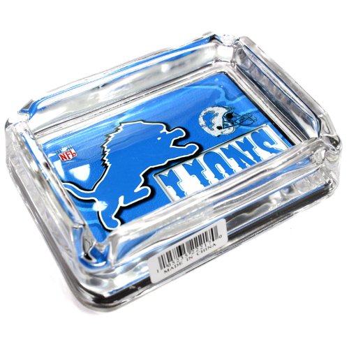 See Detroit Lions Glass Ashtray - Dimensions 3 Inch x 4 Inch - Simulated Black Velvet Botton