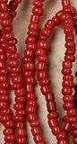 Beaded Triple Strand Necklace - Coral