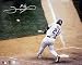 Sammy Sosa Chicago Cubs -Home Run Swing- Autographed Photograph