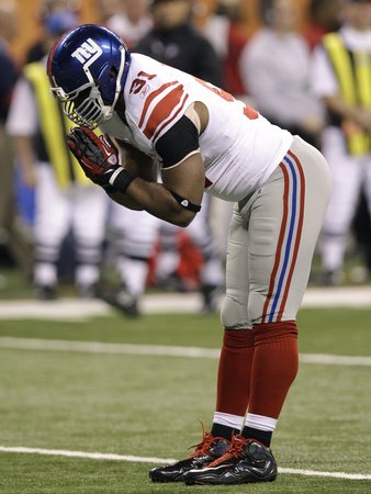 New York Giants and New England Patriots - Super Bowl XLVI - February 5, 2012: Justin Tuck Photographic Poster Print by David J. Phillip, 42x56