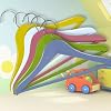 Pack of 12 high quality coloured wooden coat hangers for childrens' clothes - 32cm wide