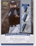 2007 Upper Deck Premier Patches Triple #RO - Roy Halladay - Toronto Blue Jays - Serial #d 67/99 - Game Used Jersey Swatch