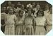 Photo Some of the young girls who roll cigarettes in the Danville Va. Cigarette Factory. I could not induce the very
