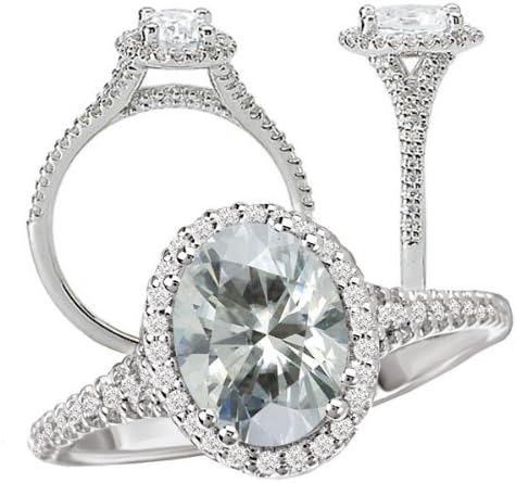 18k Elite Collection lab-grown 7x5mm oval moissanite diamond halo engagement ring with split shank