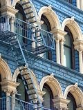 Blue and Cream Building with Fire Escape - 18H x 14W - Peel and Stick Wall Decal by Wallmonkeys